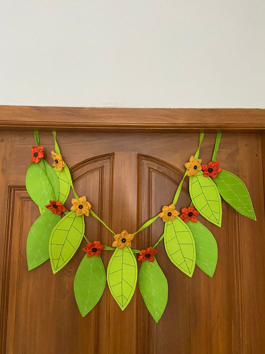 mango-leaf-thoran-handmade-and-upcycled-on-door