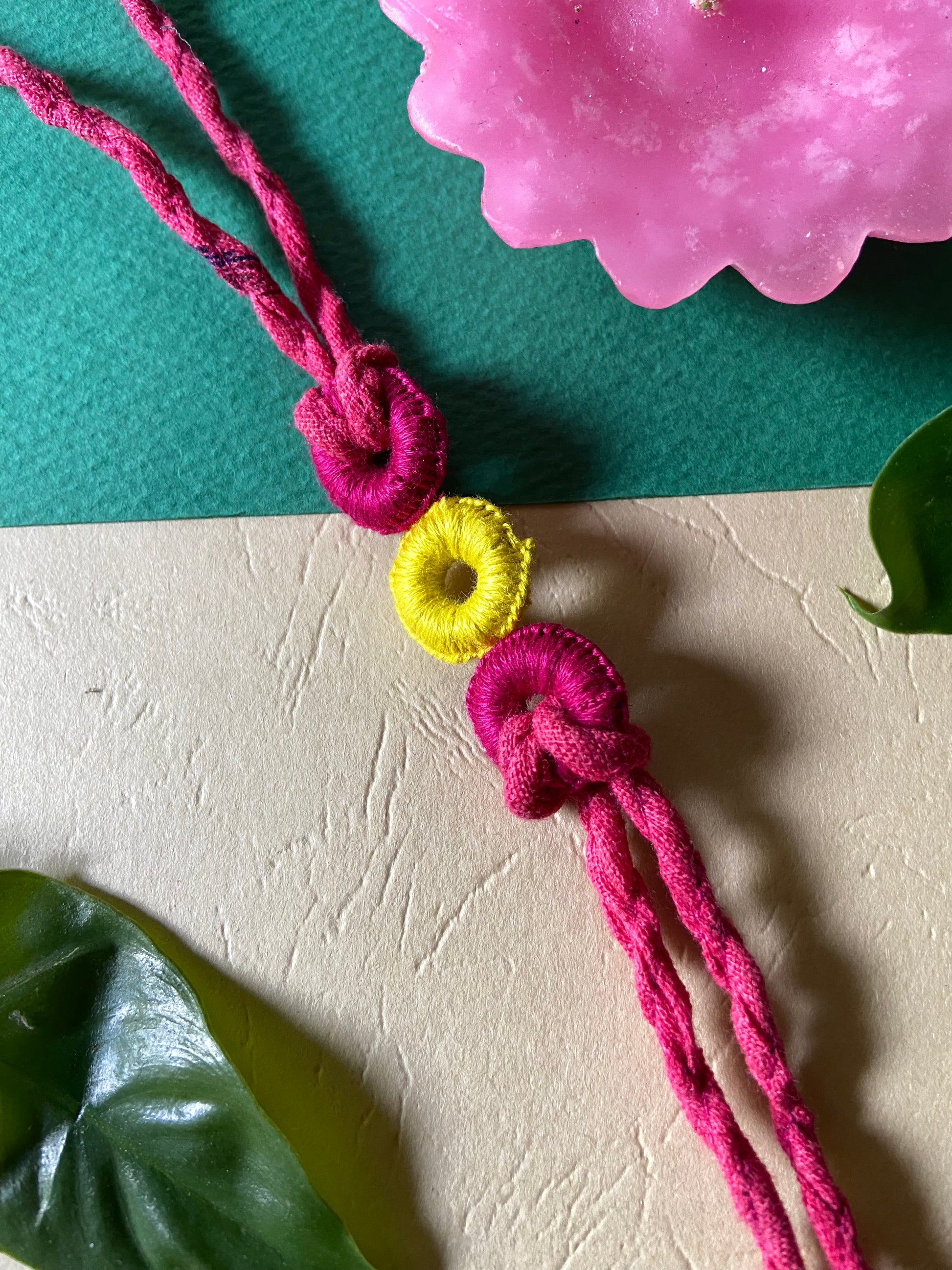 3-circle-Upcycled-Rakhi-pink-yellow