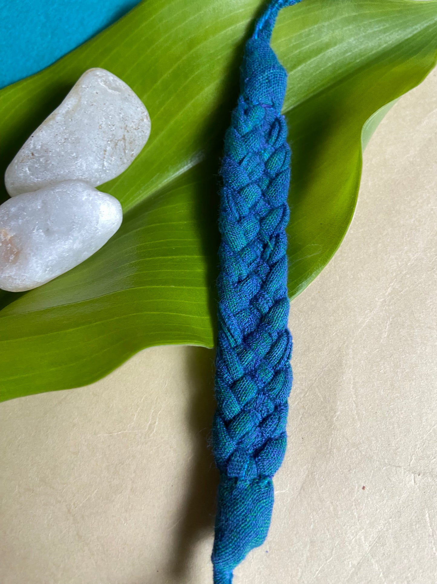 flat-braided-Upcycled-Rakhi-blue-close-up