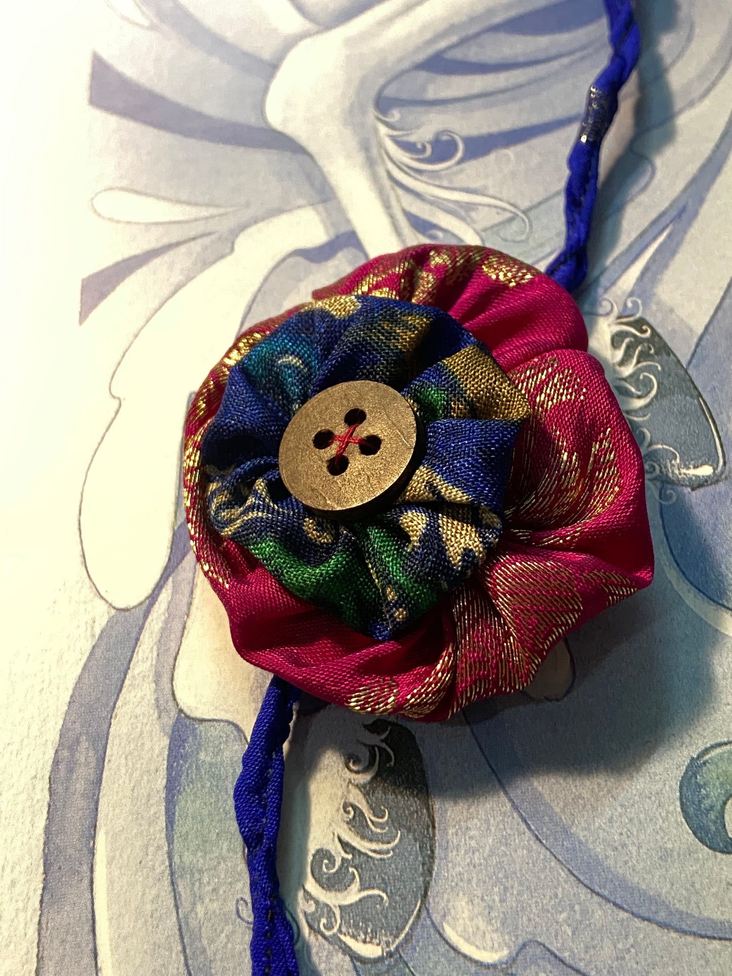 double-layer-flower-Upcycled-Rakhi-pink-blue-close-up-india