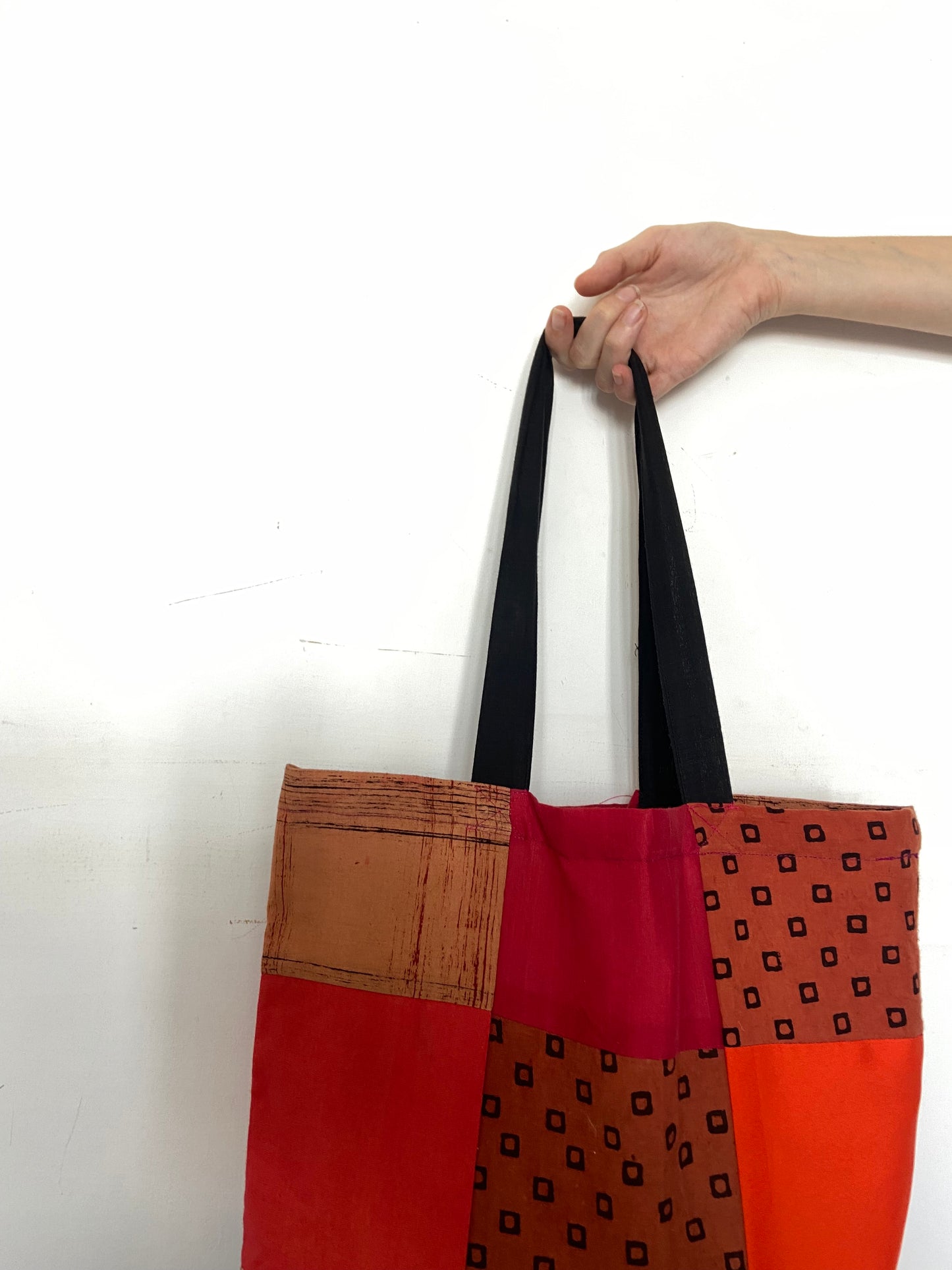 patchwork-tote-bag-upcycled-and-handmade-earthy-orange-close-up