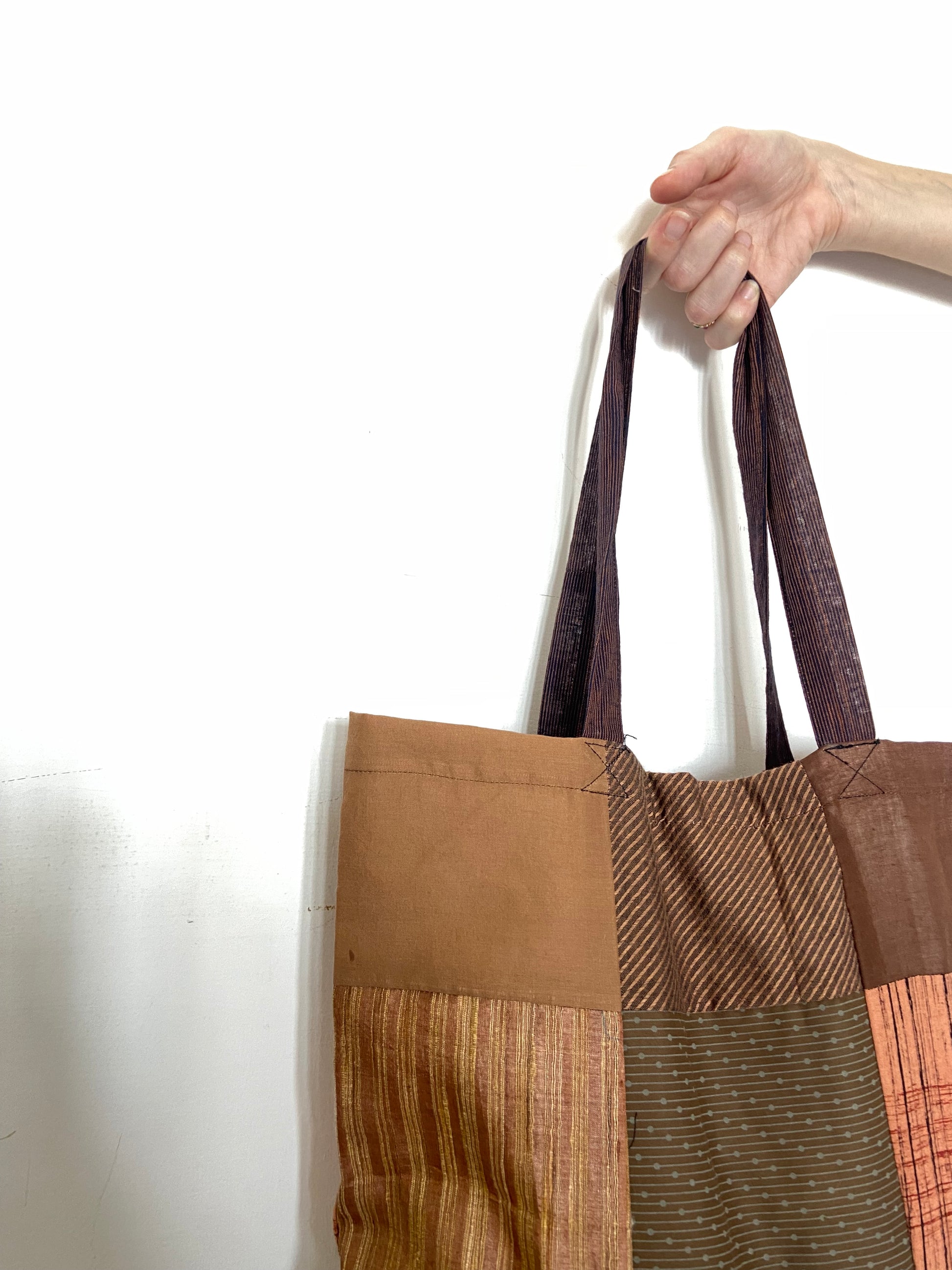 patchwork-tote-bag-upcycled-and-handmade-earthy-brown-close-up