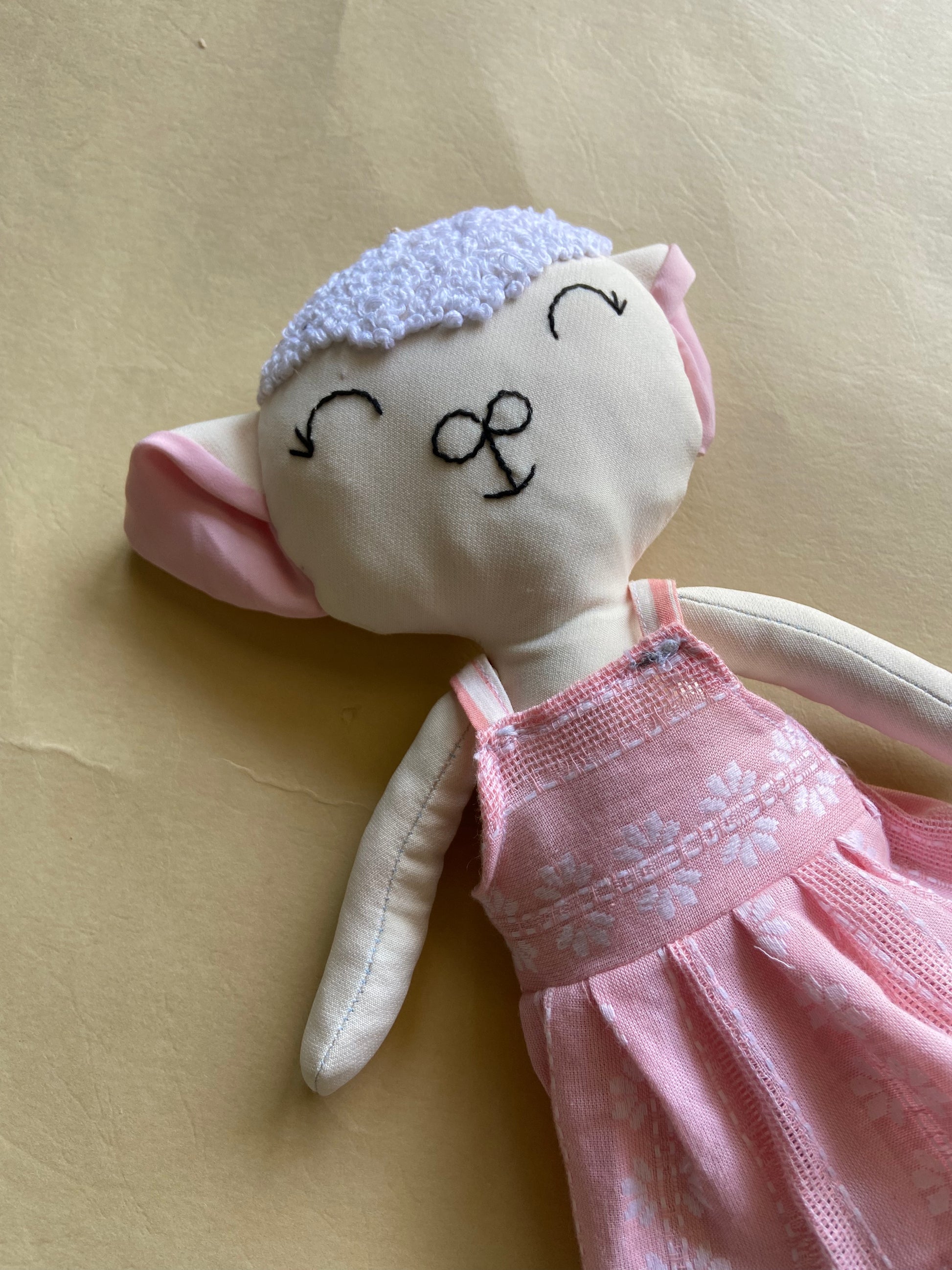 sheep-stuffed-toy-upcycled-and-handmade-pink-doll-close-up